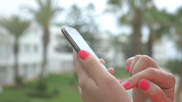 High quality video of woman using phone in 4K