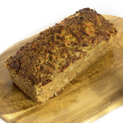 Freshly cooked meatloaf on wooden board