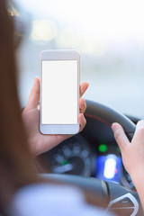 People using smart phone in car.