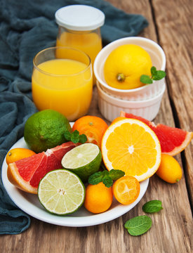 Juice and fresh citrus fruits
