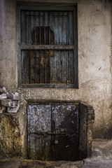 Dirty rusty window and door, Jodhpur, India