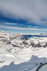 Fototapeta na wymiar Sunny view of Dolomite Alps near Alta Badia of Val di Fassa, Trentino-Alto-Adige region, Italy.