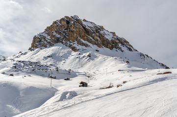 Sunny view of Dolomite Alps near Canazei of Val di Fassa, Trentino-Alto-Adige region, Italy.