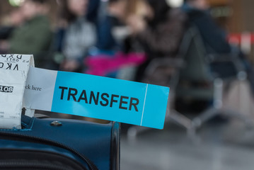 Close up photograph of baggage with transfer label