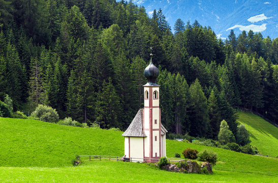 Famous San Giovanni church in Ranui, Santa Magdalena, Dolomite Alps, Italy