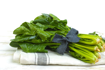 Fresh green Spinach leaves - diet and health concept
