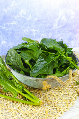 Fresh green Spinach leaves - diet and health concept