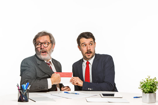 Concept - corruption. Businessman in a suit taking a bribe