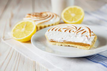 Tartlets with white cream and lemon curd shallow depth of field