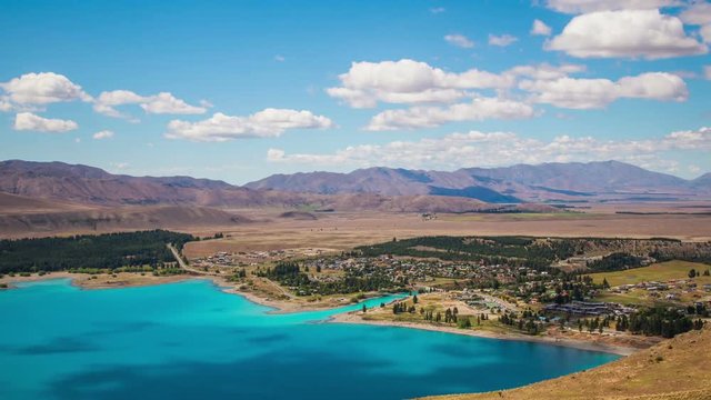 Time Lapse - Ariel View of Lake Tekapo with Mountain Range