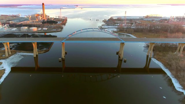 Scenic Leo Frigo Memorial Bridge in Green Bay, Wisconsin. AKA, Tower Drive Bridge.  Sunrise aerial flyby looking North toward the bay of Green Bay.
