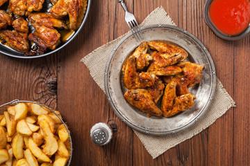 Baked wings, served with dip or baked potatoes.