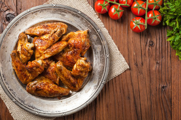 Baked wings, served with dip or baked potatoes.