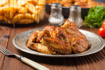 Baked wings, served with dip or baked potatoes.