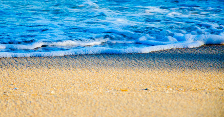 Sand beach with sea waves