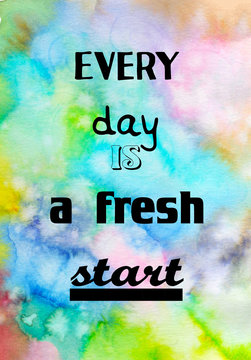 Every day is a fresh start. Motivational quote on watercolor texture.