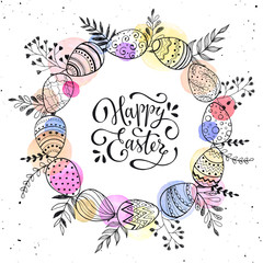 Easter wreath with easter eggs hand drawn black on white background. Decorative doodle frame from Easter eggs and floral elements. Easter eggs with ornaments in circle shape with watercolor dots.