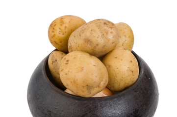 cast iron pot with a potato