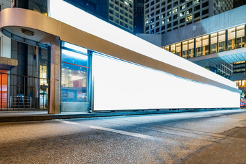 Blank billboard at bus stop in city of China.