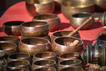 Obraz na płótnie Canvas Tibetan singing bowls at the market in Nepal
