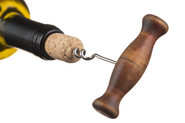 pulling corkscrew cork from the bottle