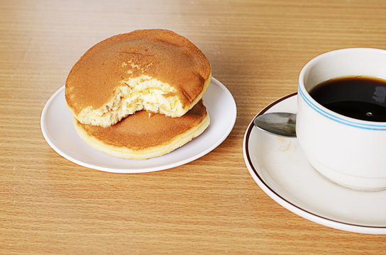 Delicious Japanese bean pancake with black coffee cup
