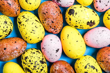 Easter background with colored easter eggs, texture