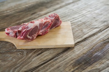 Sirloin chop on wooden board