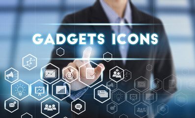 Fototapeta na wymiar Businessman hand chooses Gadgets icons wording on interface screen. internet technology service concept. can used for cover page presentation and web banner.