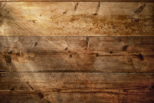 Wood texture background with beams of light.