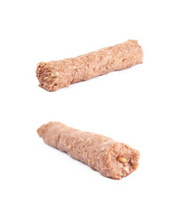 Raw kebab meat on a stick