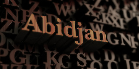 Abidjan - Wooden 3D rendered letters/message.  Can be used for an online banner ad or a print postcard.