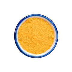 Curcuma powder in bowl on white. This has clipping path.
