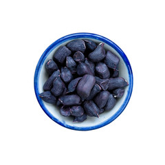  Raw Organic Pinto beans in bowl on white. This has clipping path.