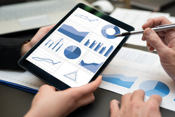 Business people using a tablet