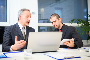 Fototapeta premium Business people at work in an office