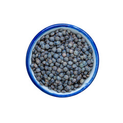Green lentils in bowl on white. This has clipping path.