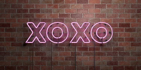 XOXO - fluorescent Neon tube Sign on brickwork - Front view - 3D rendered royalty free stock picture. Can be used for online banner ads and direct mailers..