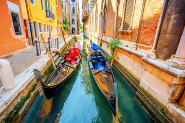 Fototapeta na wymiar Gondolas in the channel. Venice, Italy.