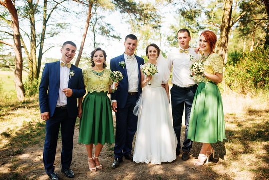 Wedding couple with bridesmaids and best stay at sunny wood.
