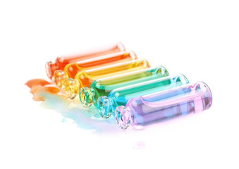 Set of tiny vial bottles isolated