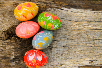 Fototapeta na wymiar Easter eggs on wooden background