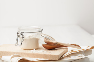 starch, soda in the pot and two wooden spoons
