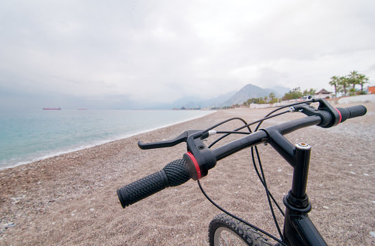 Bicycle handlebars on the sea beach