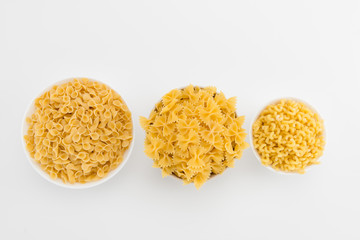 Raw italian macaroni in plates