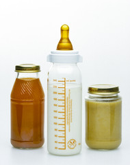 Healthy baby food, milk bottle and baby food