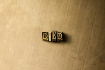 DIED - close-up of grungy vintage typeset word on metal backdrop. Royalty free stock illustration.  Can be used for online banner ads and direct mail.