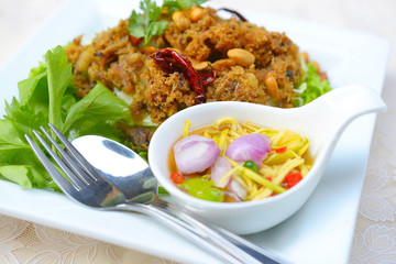 Crispy catfish salad with green mango and vegetable
