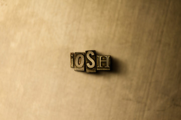 JOSH - close-up of grungy vintage typeset word on metal backdrop. Royalty free stock illustration.  Can be used for online banner ads and direct mail.