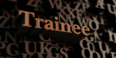 trainee - Wooden 3D rendered letters/message.  Can be used for an online banner ad or a print postcard.
